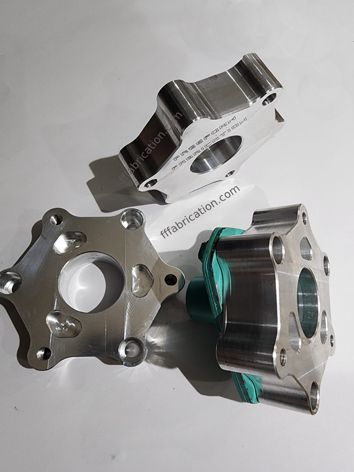 Metal mechanical components on a white background