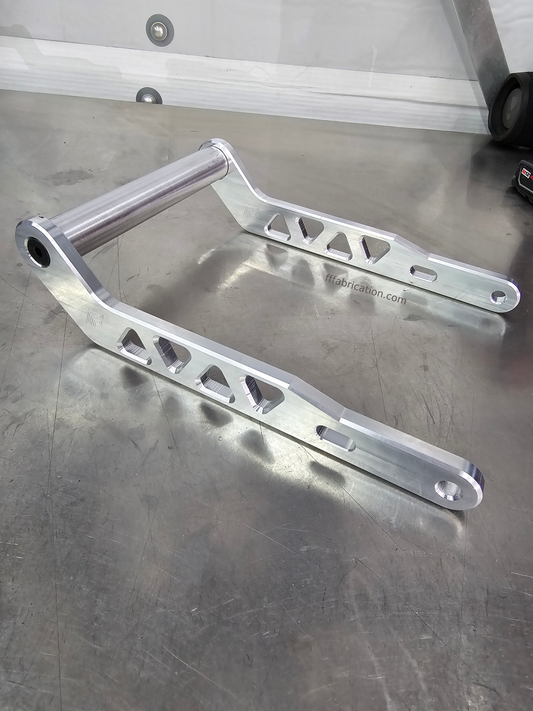 Metal bracket on a metallic surface with a blurred background