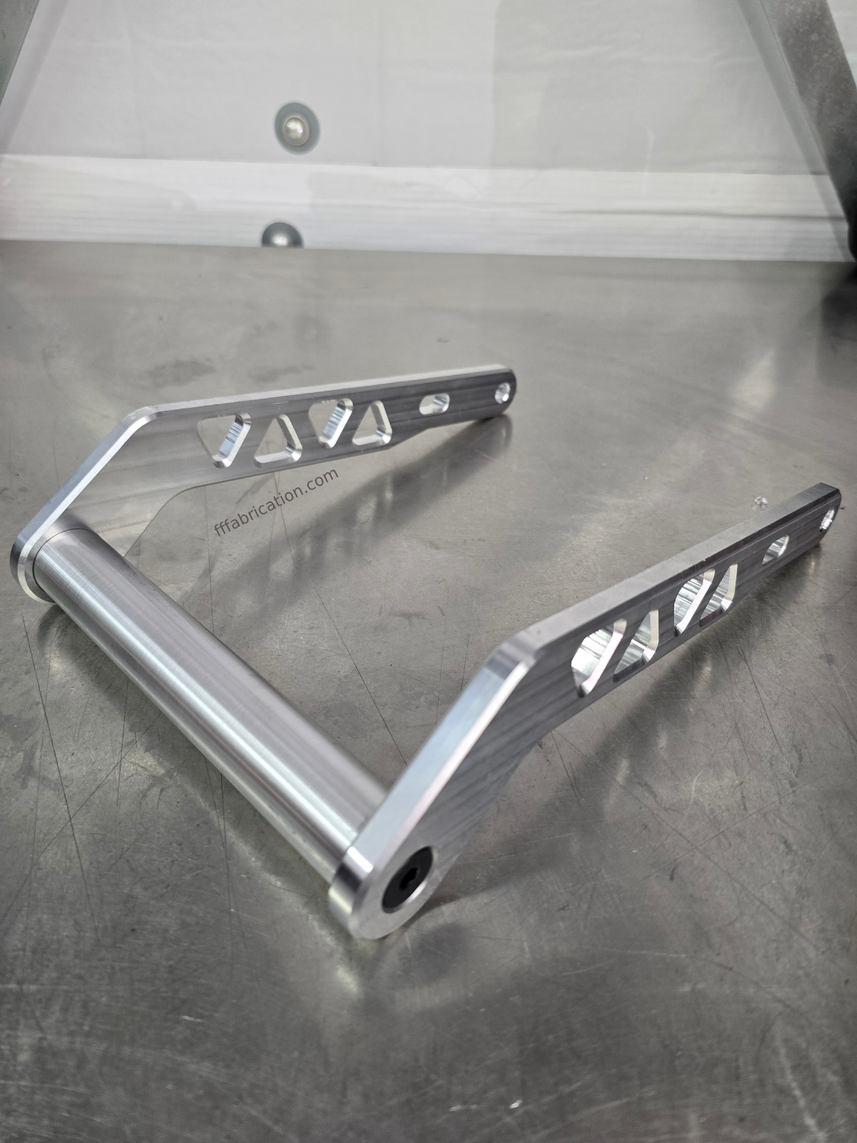 Metal bracket on a reflective surface