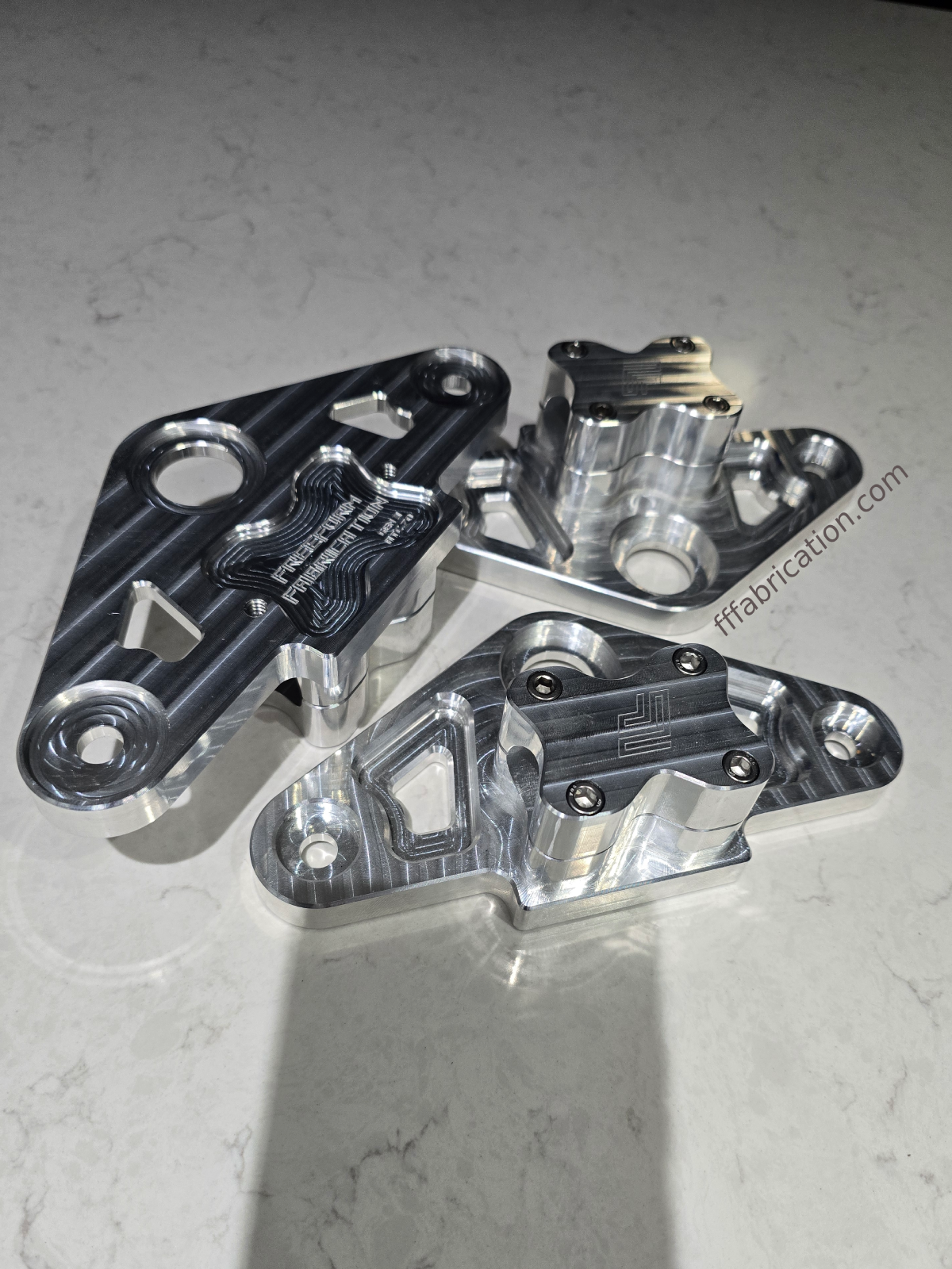 Metal mechanical components on a gray surface