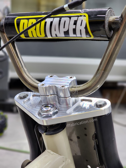 Close-up of a ProTaper bike suspension fork with a blurred background