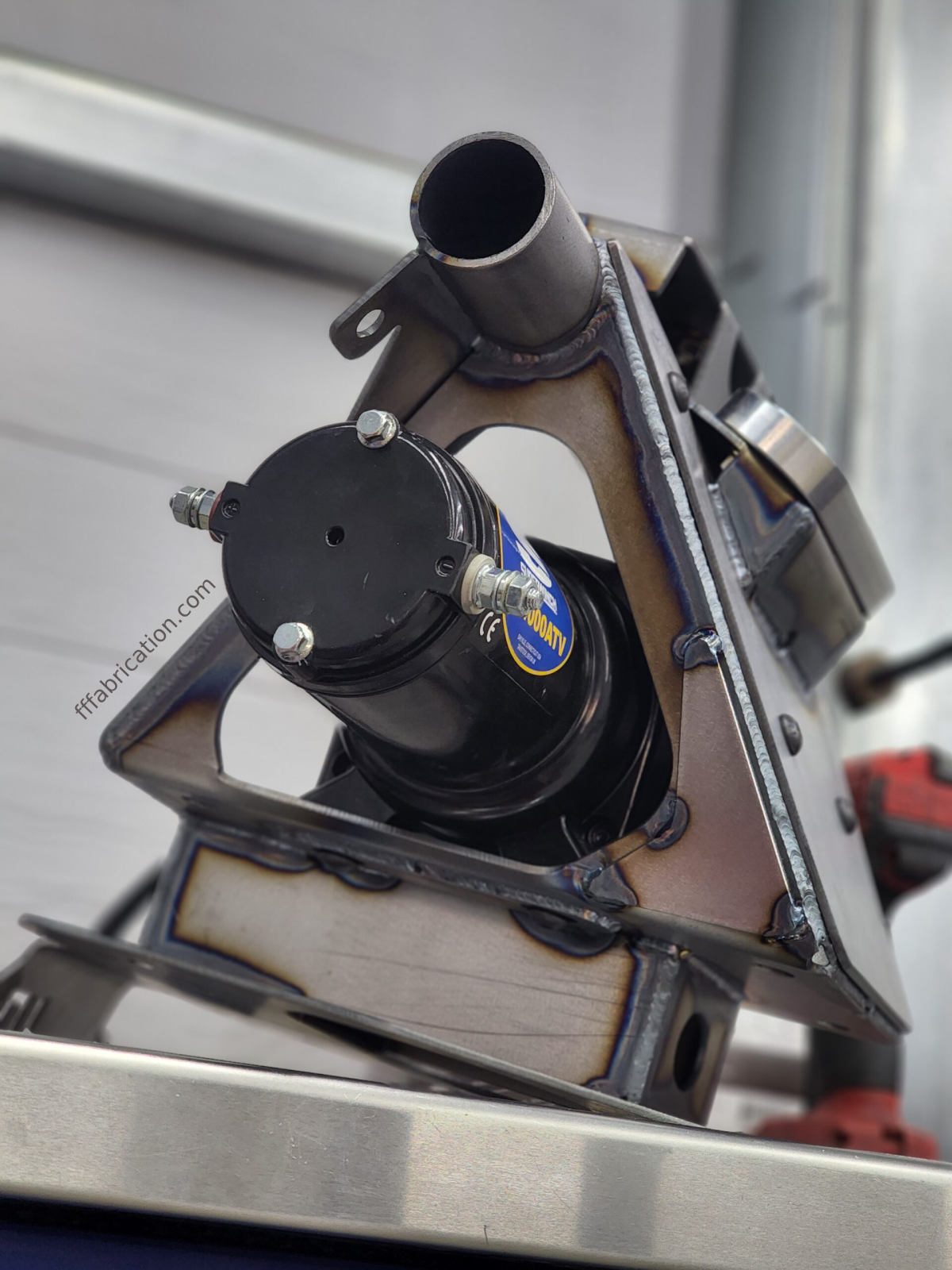 Metal cutting machine on a metal surface with a blurred background