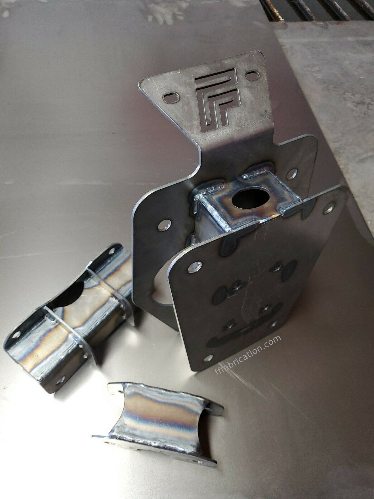 Metal bracket and components on a metallic surface